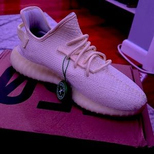 Yeezy butter size 9.5 with StockX tag